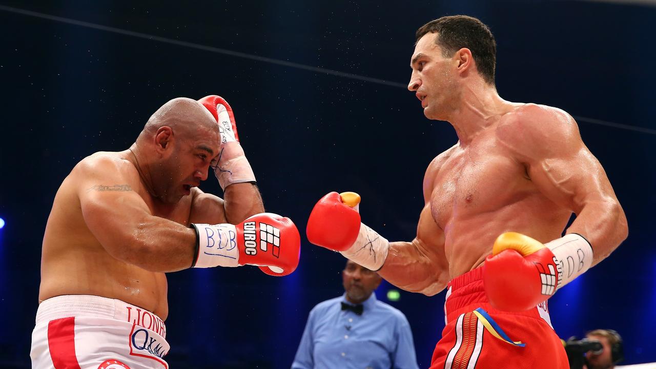 Wladimir Klitschko (right) exchanges punches with Alex Leapai Sr during their WBO, WBA, IBF and IBO heavy weight title fight in 2014 in Germany. Picture: Getty Images