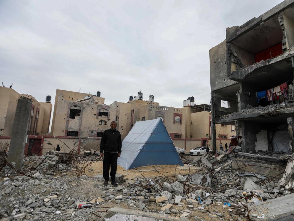 Palestinian Hamada Abu Salima lives in a tent on the ruins of his house that was destroyed by Israeli raids in Rafah that killed 10 members of his family. Picture: Getty Images