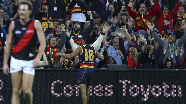 Eddie Betts celebrates with Adelaide fans after kicking the goal of the year. Picture: Sarah Reed