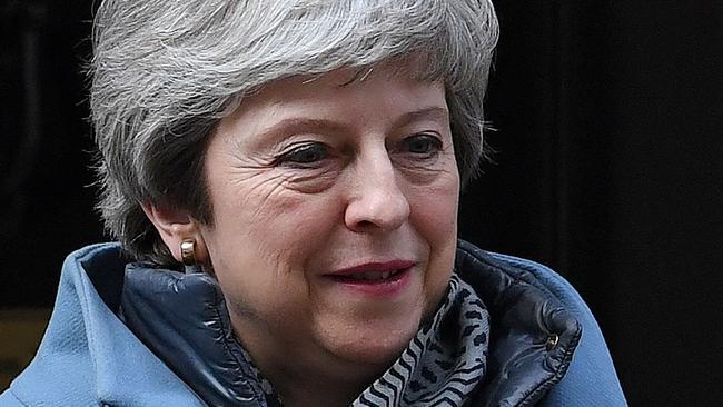 Britain's Prime Minister Theresa May leaves from 10 Downing Street on March 26, 2019. - Britain's parliament began plotting a new Brexit strategy today after seizing the initiative in the floundering process from Prime Minister Theresa May's government in a historic vote. (Photo by Paul ELLIS / AFP)