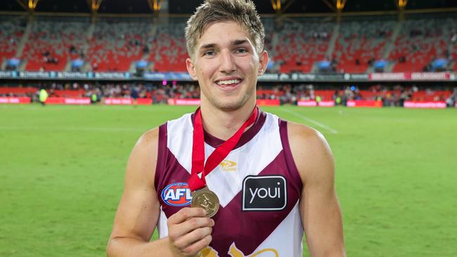 GOLD COAST, AUSTRALIA - APRIL 24: Player of the match Zac Bailey of the Lions poses for a photo after the 2022 AFL Round 06 match between the Gold Coast Suns and the Brisbane Lions at Metricon Stadium on April 24, 2022 in the Gold Coast, Australia. (Photo by Russell Freeman/AFL Photos via Getty Images)