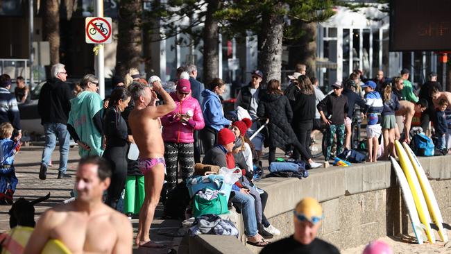 People out and about at Manly Beach on Thursday. Picture: Tim Hunter.