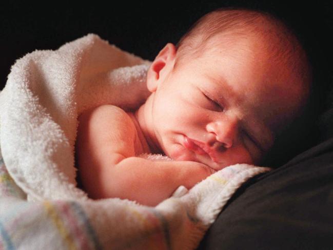 Generic photo of a newborn sleeping baby.