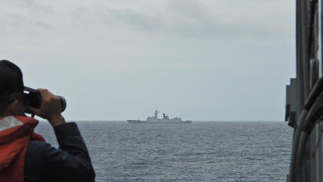 A Taiwanese navy sailor monitors a Chinese navy warship in August 2023. Picture: Taiwan's Ministry of National Defense/AFP