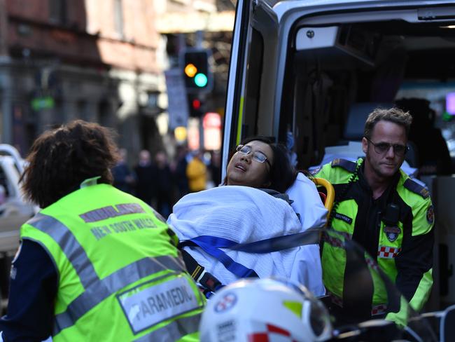 A close-up of the woman who was taken by ambulance from Hotel CBD at the corner of King and York Street in Sydney. Picture: AAP