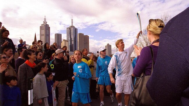 Woodhouse carried the Olympic Torch in Melbourne, on the way to Sydney in 2000. Picture: Hamish Blair/ALLSPORT