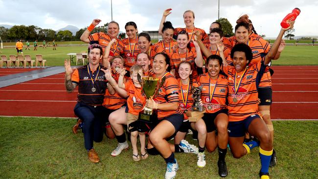 Mudcrabs' celebrate their premiership win. PICTURE: STEWART McLEAN