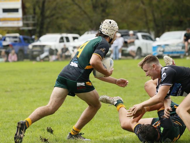 Mittagong’s Joe Eccleston escapes the scene. Picture: Warren Gannon Photography