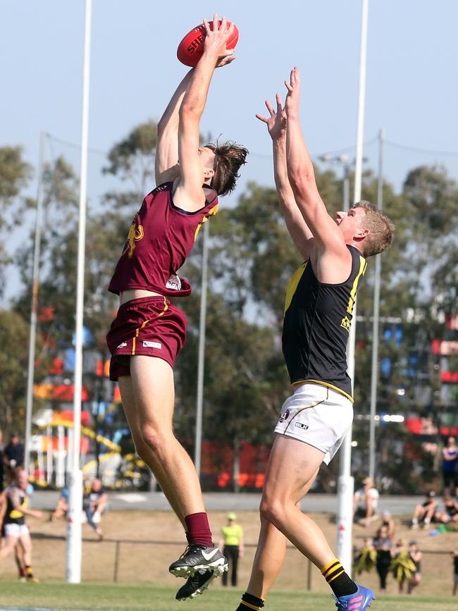 QAFL grand final between Palm Beach Currumbin and Labrador at Southport Sharks. Photo of Caleb Graham takes a mark. Photo by Richard Gosling