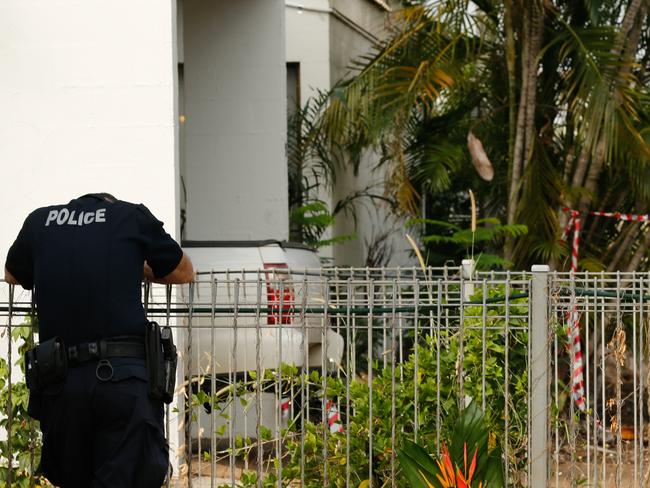 A weary NT Police Officer at the scene of the shooting at Gardens Crescent in Darwin. Picture: Glenn Campbell