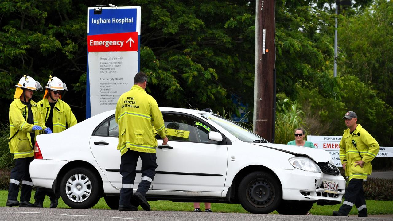 Hero firefighter Luke Giudicatti, station officer at Ingham Fire and Rescue Station, in action dealing with the aftermath of a two-vehicle collision outside Ingham Hospital on the day it was announced that he was one of three Queenslanders to receive the Bravery Medal. Two people suffered minor injuries in the accident. Picture: Cameron Bates