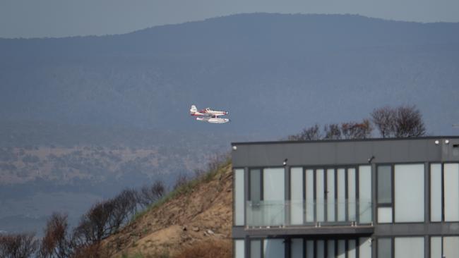 Firefighting efforts at Dolphin Sands. Picture: Tony Fist