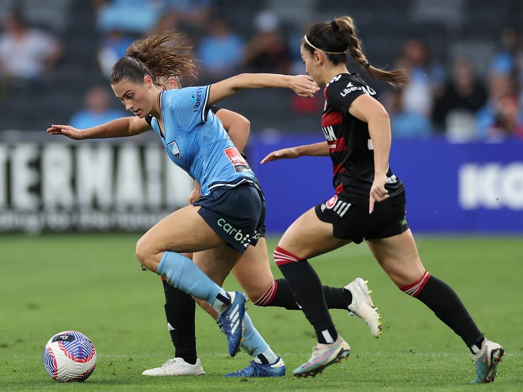 Margaux Chauvet under plenty of pressure from two Western Sydney Wanderers players. Picture: Getty Images