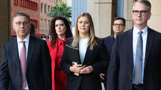 Brittany Higgins arrives at Federal Court with her legal team