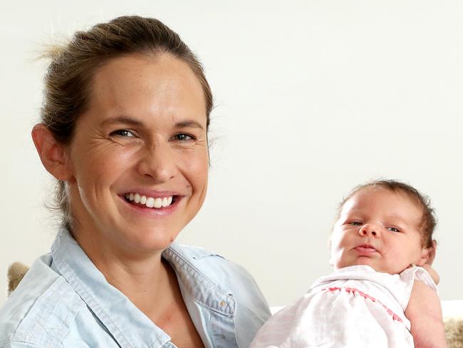 Former swimmer and Triple M radio presenter Libby Trickett at home with her newborn daughter Edwina, Morningside. Photographer: Liam Kidston