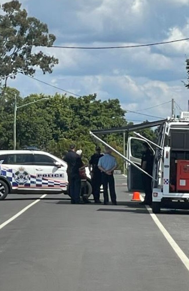 Police search a Jimboomba property and shut down roads as part of emergency declaration