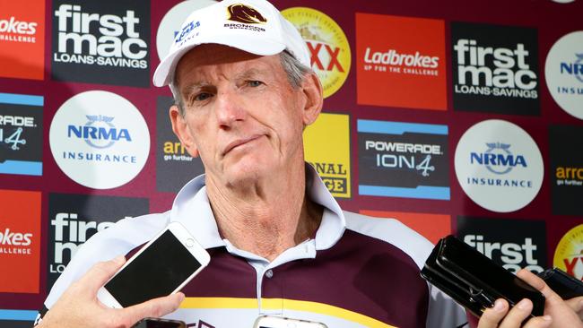 Wayne Bennett talks to the media.