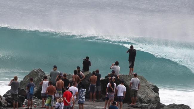Surfers at Snapper Rocks and Kirra riding the Large swell produced by Cyclone OMA. Photograph : Jason O'Brien
