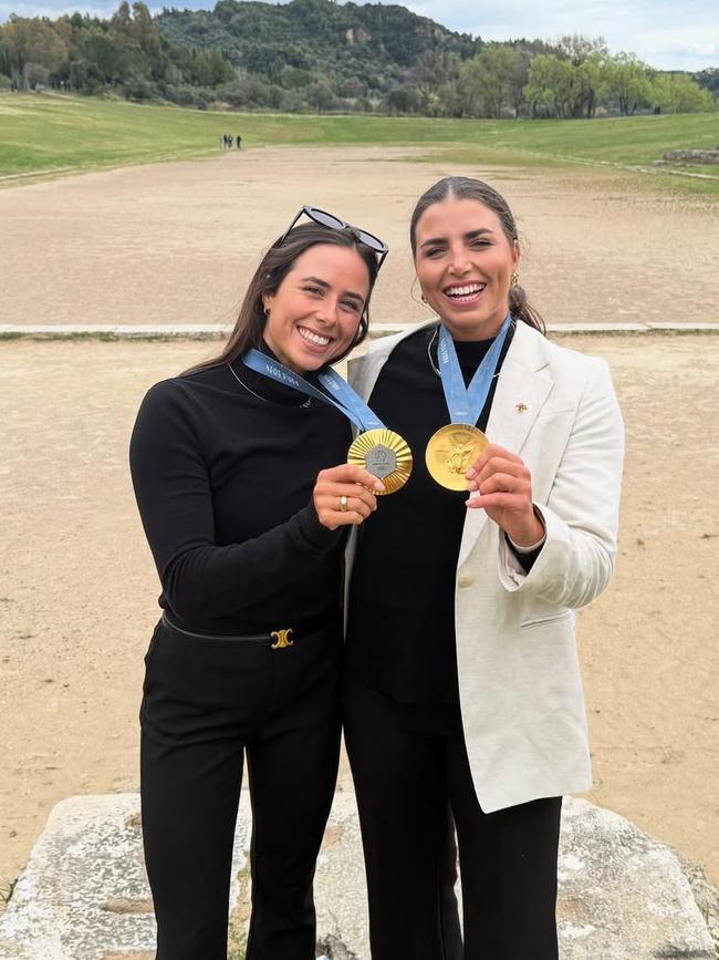 Sisters Noemie (L) and Jess Fox display their Olympic medals on the sacred trip. Picture: Instagram