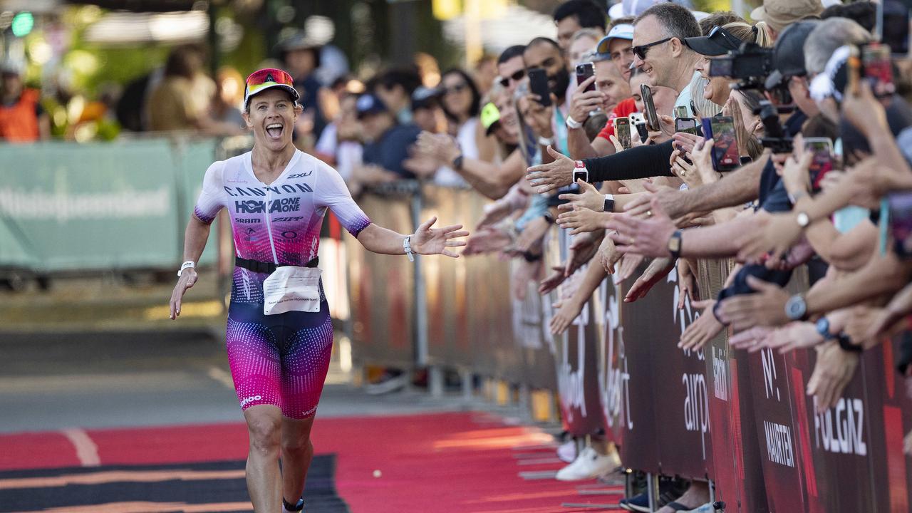 Cairns Iron Man - Womens Pro Winner Sarah Crowley ecstatic as he crosses the finish line e. Picture: Brian Cassey