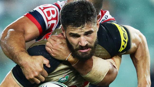 SYDNEY, AUSTRALIA - APRIL 18: Josh Mansour of the Panthers is tackled during the round seven NRL match between the Sydney Roosters and the Penrith Panthers at Allianz Stadium on April 18, 2016 in Sydney, Australia. (Photo by Matt King/Getty Images)