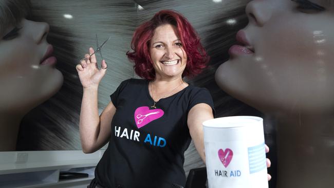 Morayfield hairdresser teaching Indonesian street people how to cut hair |  The Courier Mail