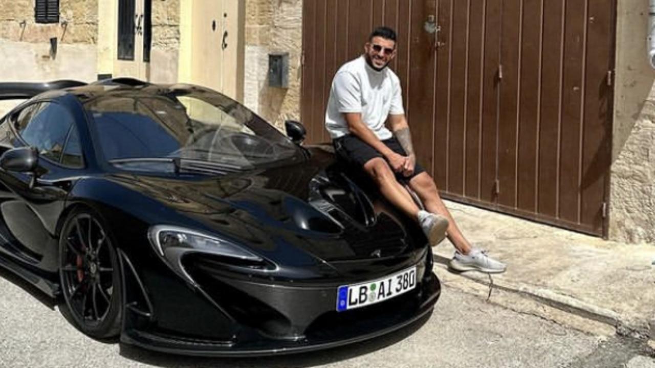 Adrian Portelli in Europe with his luxury McLaren.