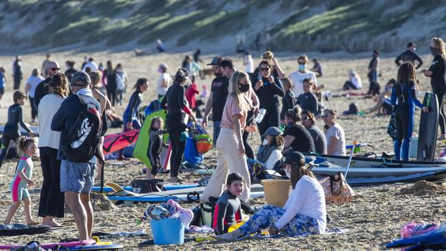 People flocked to the beach at Ocean Grove on Saturday despite a stay-at-home order. Picture: Rob Leeson