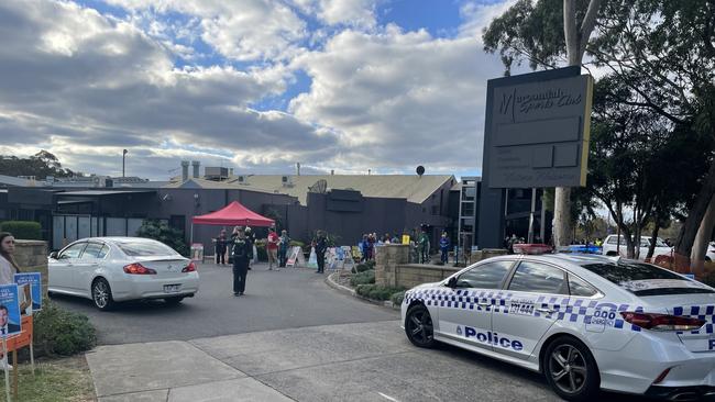 A woman was rushed to hospital after a car hit voters at Maroondah Sports Club pre-polling booth in Ringwood.