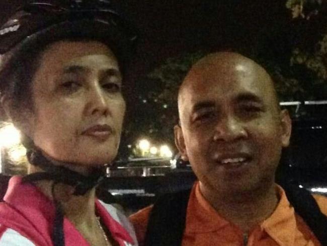 MH370 pilot Zaharie Ahmad Khan during a night cycle with his wife. Picture: Supplied