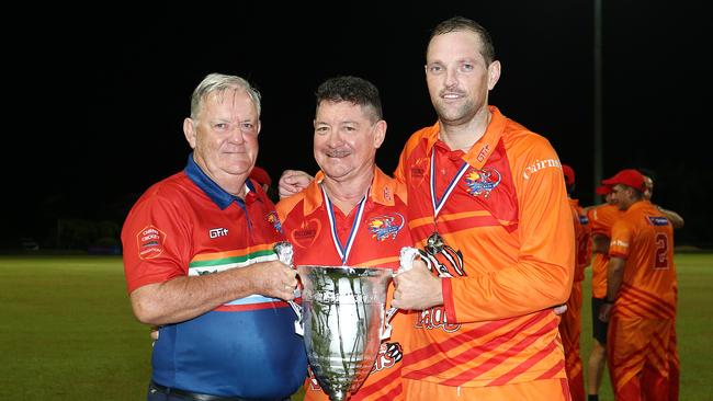 Barrier Reef Big Bash boss Kevin Maher, Piccones Badger owner John Piccone and captain Jake Roach hold the winner's trophy after winning the Barrier Reef Big Bash grand final match against the Twomey Schrieber Thunder at Griffiths Park, Manunda. Picture: Brendan Radke