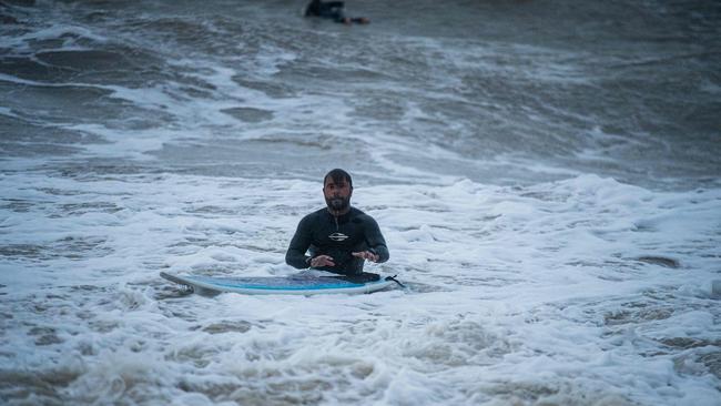 Making the most of the rare waves in the Top End. Picture: Pema Tamang Pakhrin