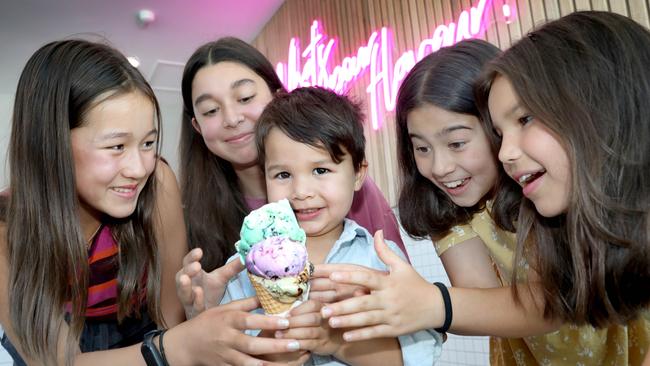 Kobi Koo, 3 with Angela Paasuke 12, of Burnside, sisters Imani Koo 13, Miley Koo 10, of Hyde Park, and cousin Nikita Koo 12, of Tusmore at 48 Flavours’s new store at Henley Beach. Picture Dean Martin