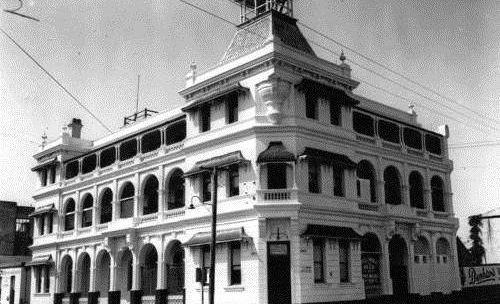 The ghost of a chambermaid who died in the 1800s is said to still haunt the halls of the Criterion Hotel, Rockhampton, pictured here in 1948. Picture: State Library of Queensland
