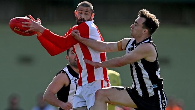 WRFL: North Footscray’s David Allitt beats Jackson Barrett of Parkside to the ball. Picture: Andy Brownbill