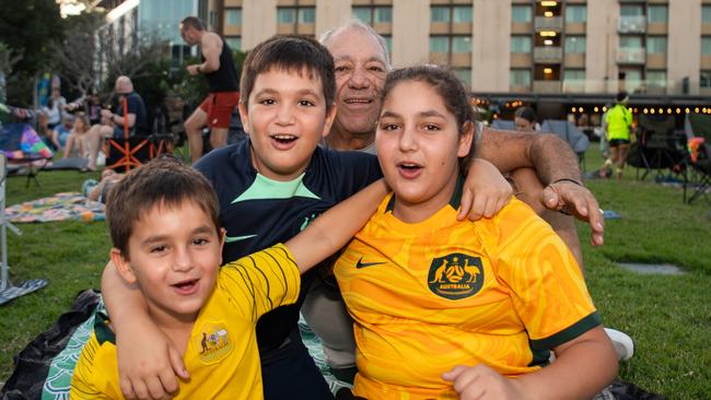 Michael Angelo Athanssiou, John Athanssiou, Angelina Athanssiou and Leo Athanssiou as thousands of fans gather to watch the Matildas take on England in the World Cup Semifinal at Darwin Waterfront. Picture: Pema Tamang Pakhrin