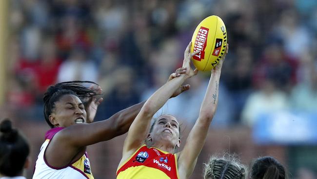 Chelsea Randall takes a strong mark against Brisbane in Round 1. Picture: Sarah Reed