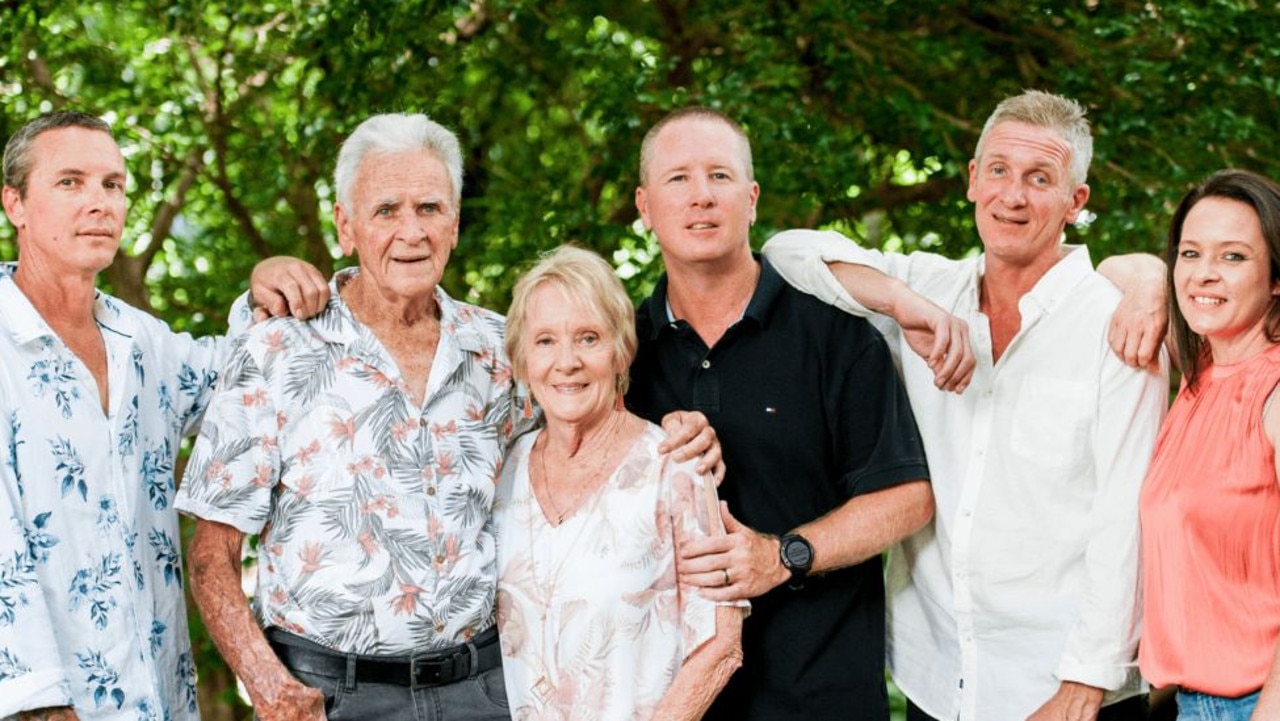Glenn and Bev, centre, with their four adult children.