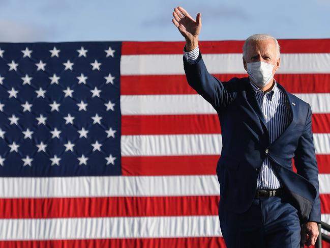 Democratic presidential nominee and former Vice President Joe Biden waves to supporters at a drive-In rally at Dallas High School. Picture: AFP