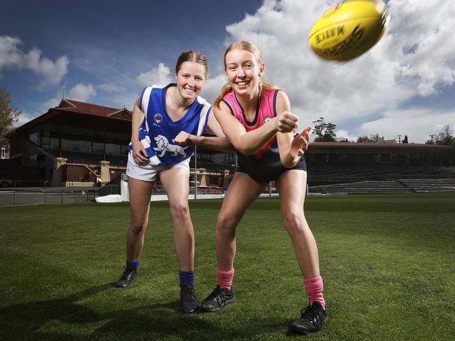 STJFL players ahead of their grand final game at North Hobart Oval, Sandy Bay's, Sophie Abel, 16 and North Hobart's, Claire Ransom, 16. Picture: Zak Simmonds