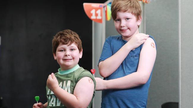 Olly Ellison, 5, and his brother Alex Ellison, 10, were vaccinated against Covid-19 at the new clinic while holidaying with their family from Melbourne. Picture: Brendan Radke
