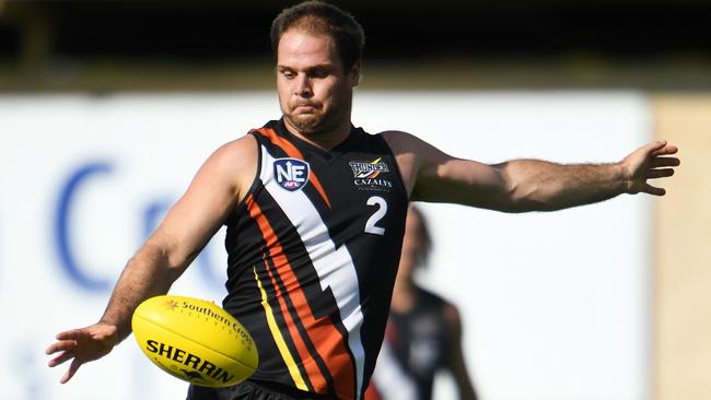 NT Thunder's Darren Ewing kicks off his wrong foot in a NEAFL game. Ewing will play with NTFL club Banks this season. Picture: Justin Kennedy