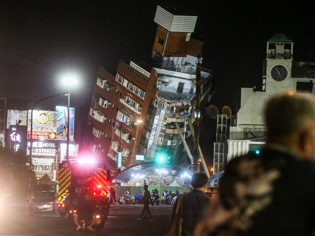 A building severely damaged by an earthquake in Japan is demolished. Picture: AFP