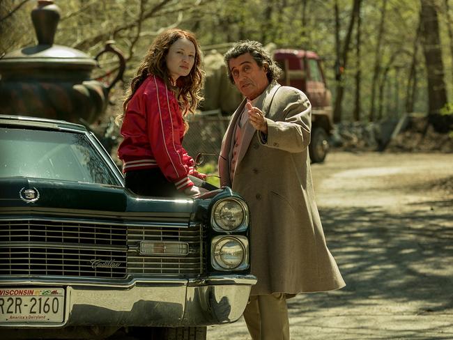 Emily Browning with Ian McShane in a scene from American Gods.