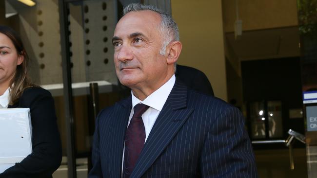 Former Hillsong pastor Pat Mesiti leaves Parramatta Court.