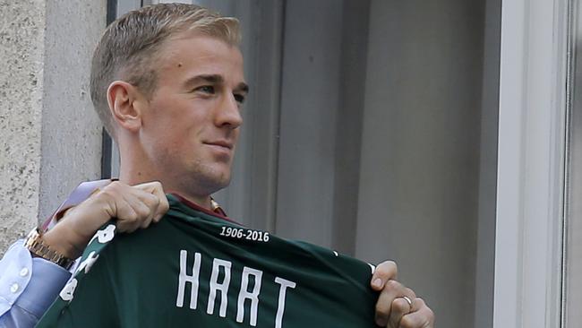 Joe Hart poses with a Turin shirt.