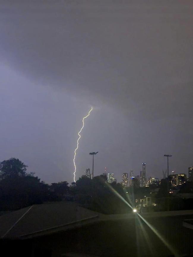 Lightning hits the CBD, viewed from Bulimba. Picture: Wezley Watson