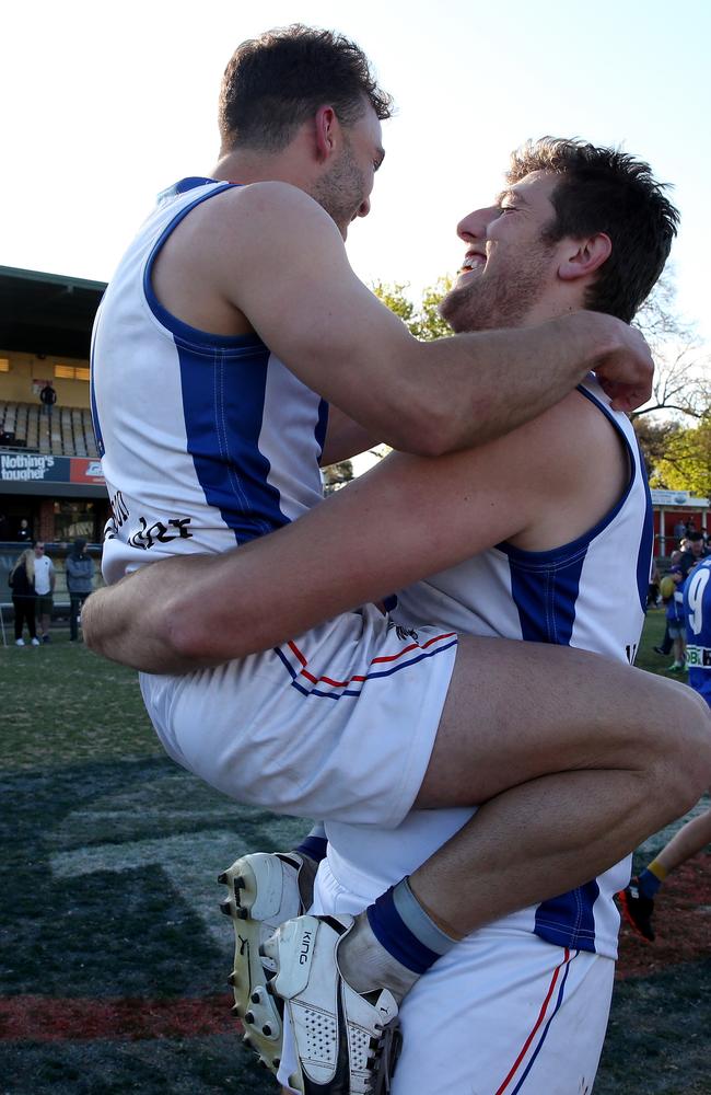 Mark Kovacevic and Matt Vincitorio embrace as West Preston-Lakeside’s celebrations begin.