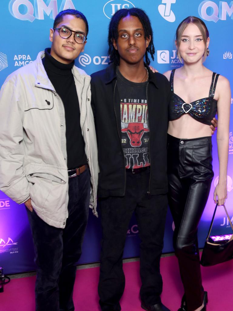 Bridget Lawrence, Nebiu Tefera and Saei Dehyadegari on the 2022 Queensland Music Awards red carpet at The Fortitude Music Hall in Brisbane. Picture: Steve Pohlner