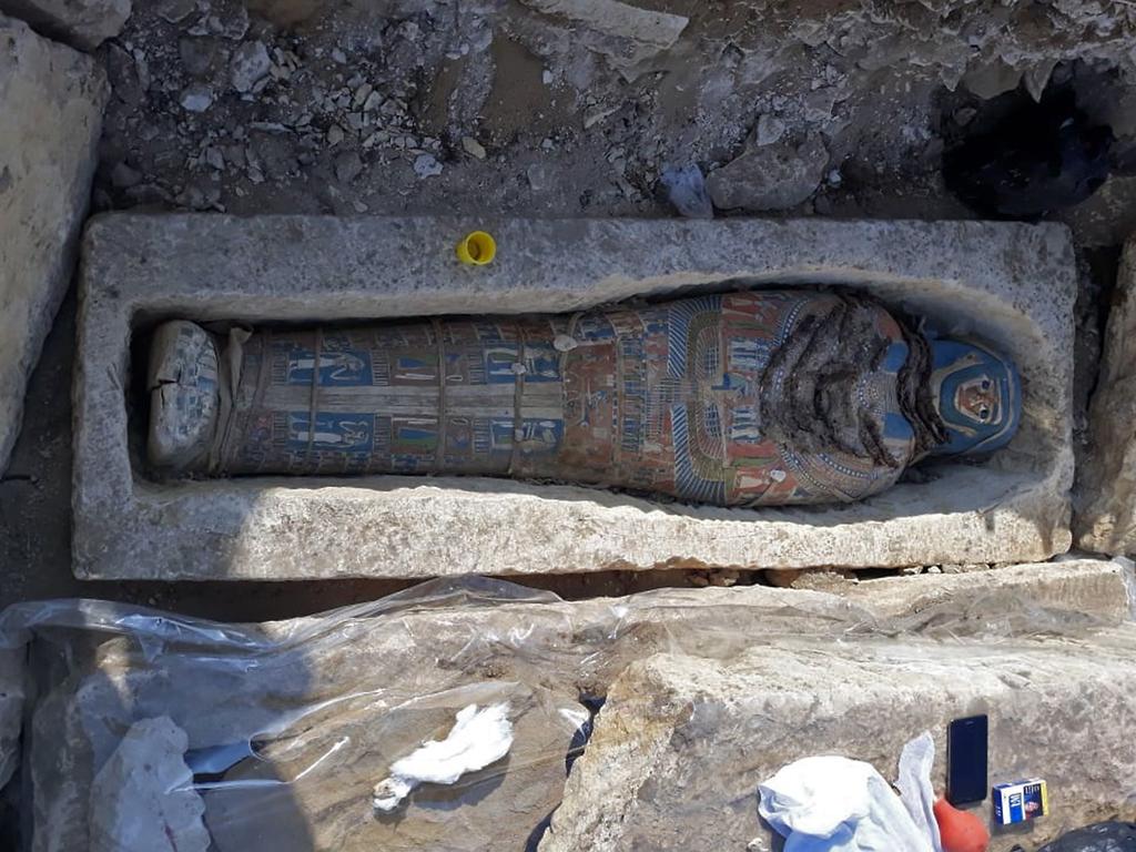 A newly-uncovered mummy, dating back over 2,300 years, found by Egyptian archaeologists at a pyramid complex south of Cairo Picture: AFP